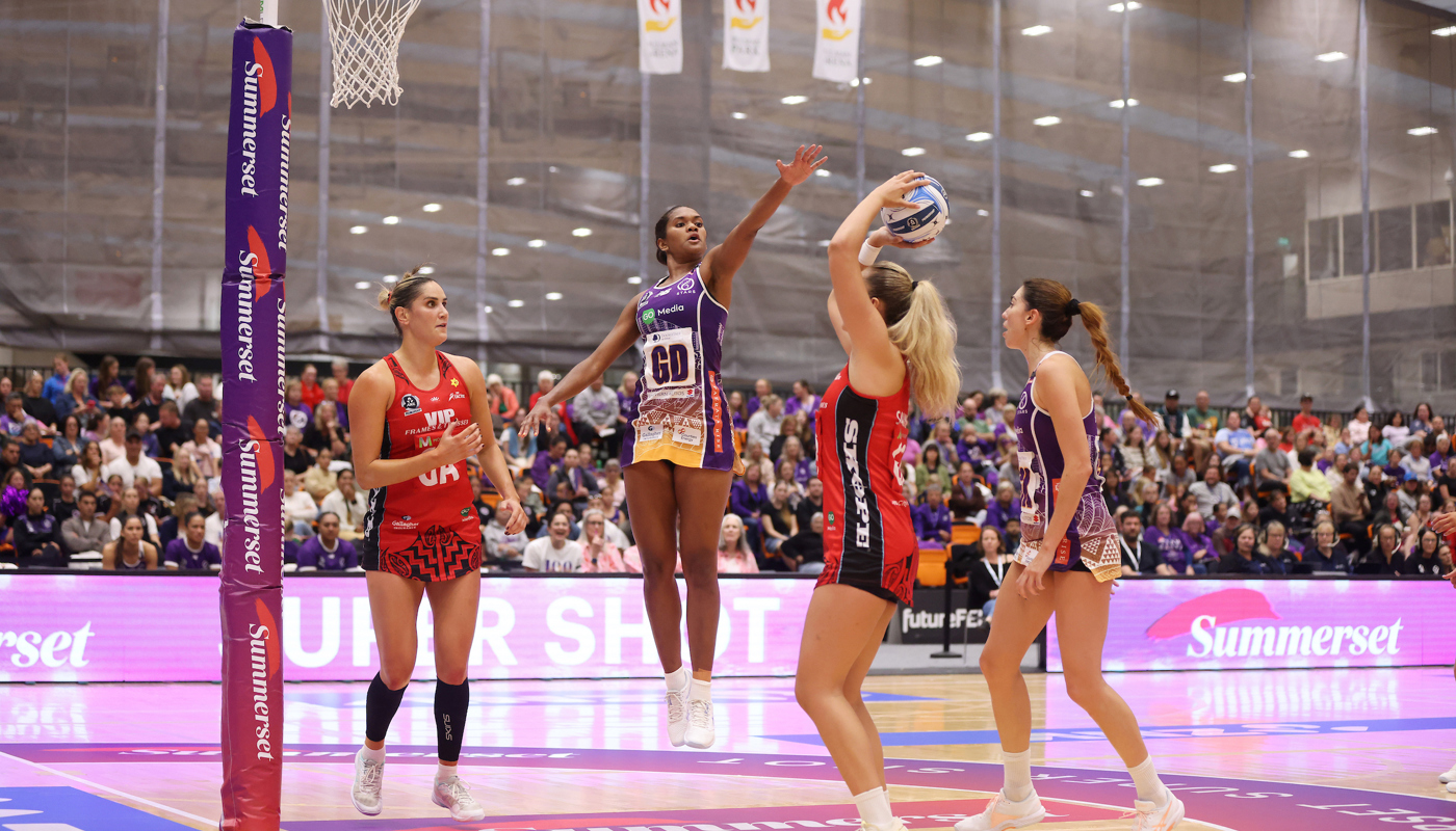 Stars Goal Defender blocking Tactix Goal shooter. 