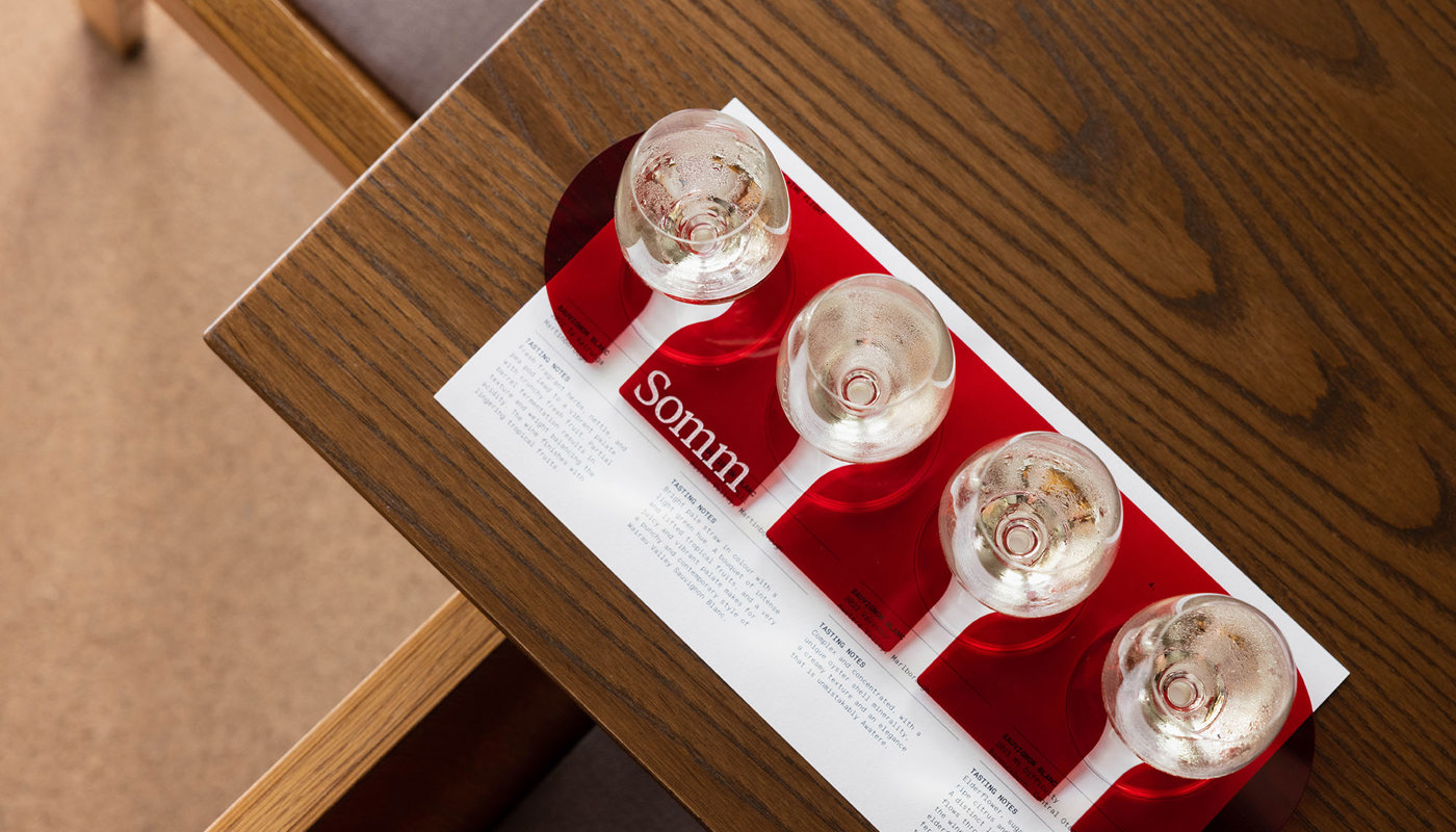 Four glasses of white wines at Somm.