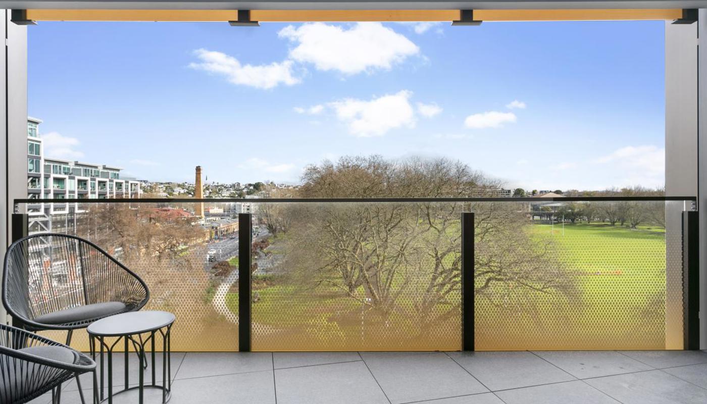 Large balcony overlooking Victoria Park.