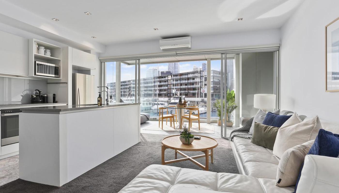 Spacious kitchen and living room flows through to the large covered balcony.