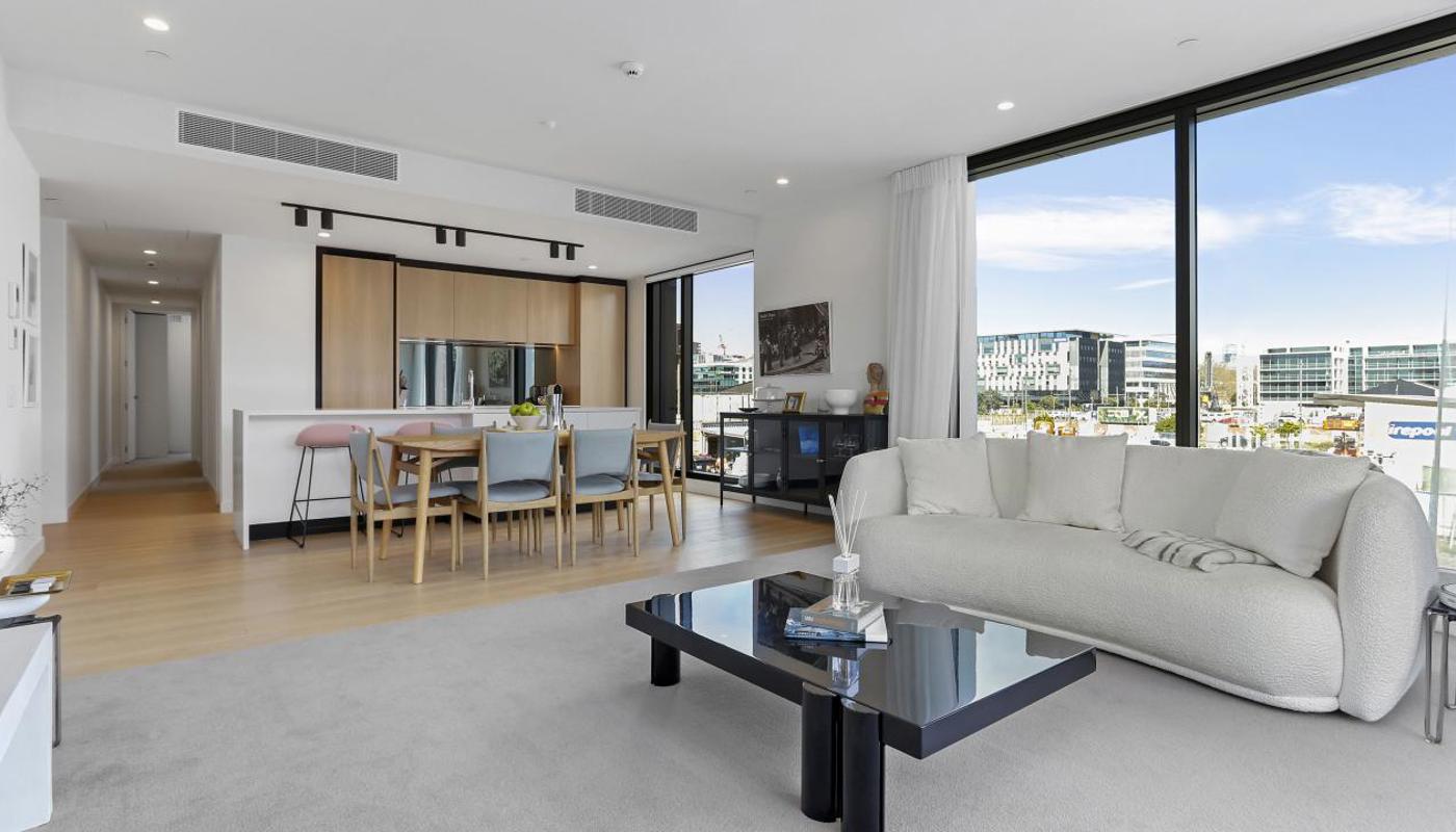 Spacious open floor plan combines the living room, dining area and kitchen area.