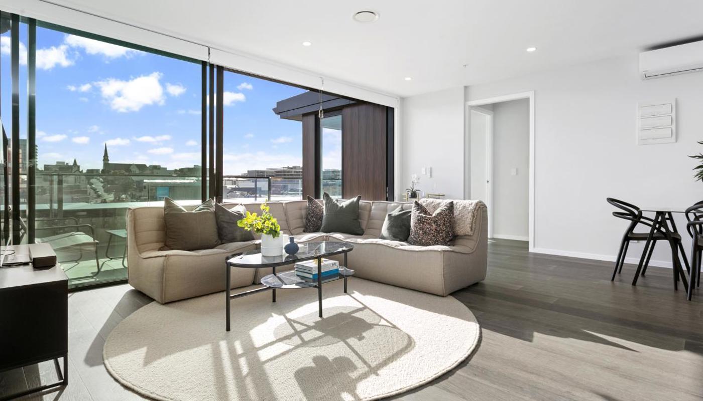 Spacious living flows out to the large sunny balcony