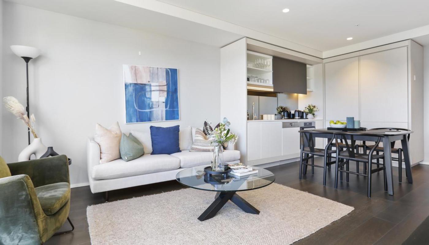Open plan living connects the living room, dining area and kitchen