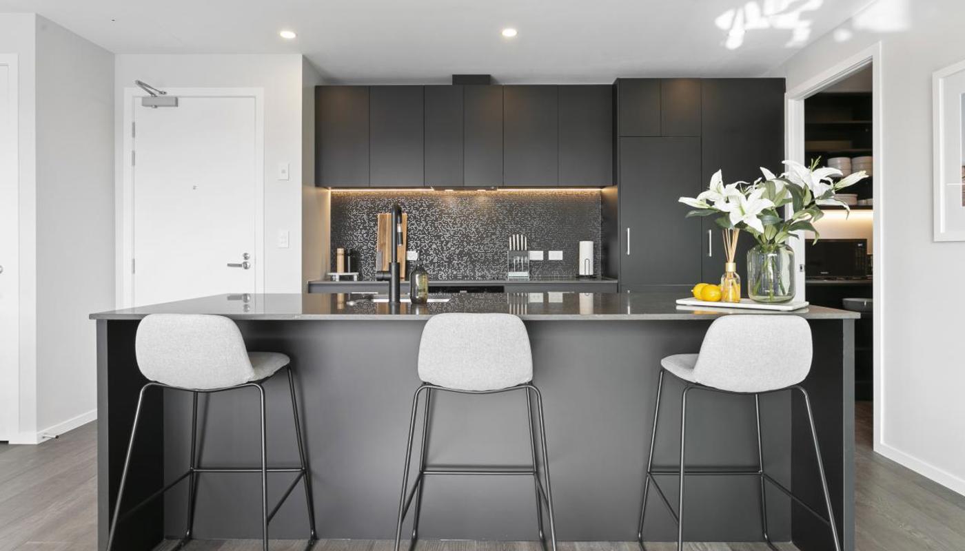 Kitchen comes equipped with modern appliances and cooking essentials