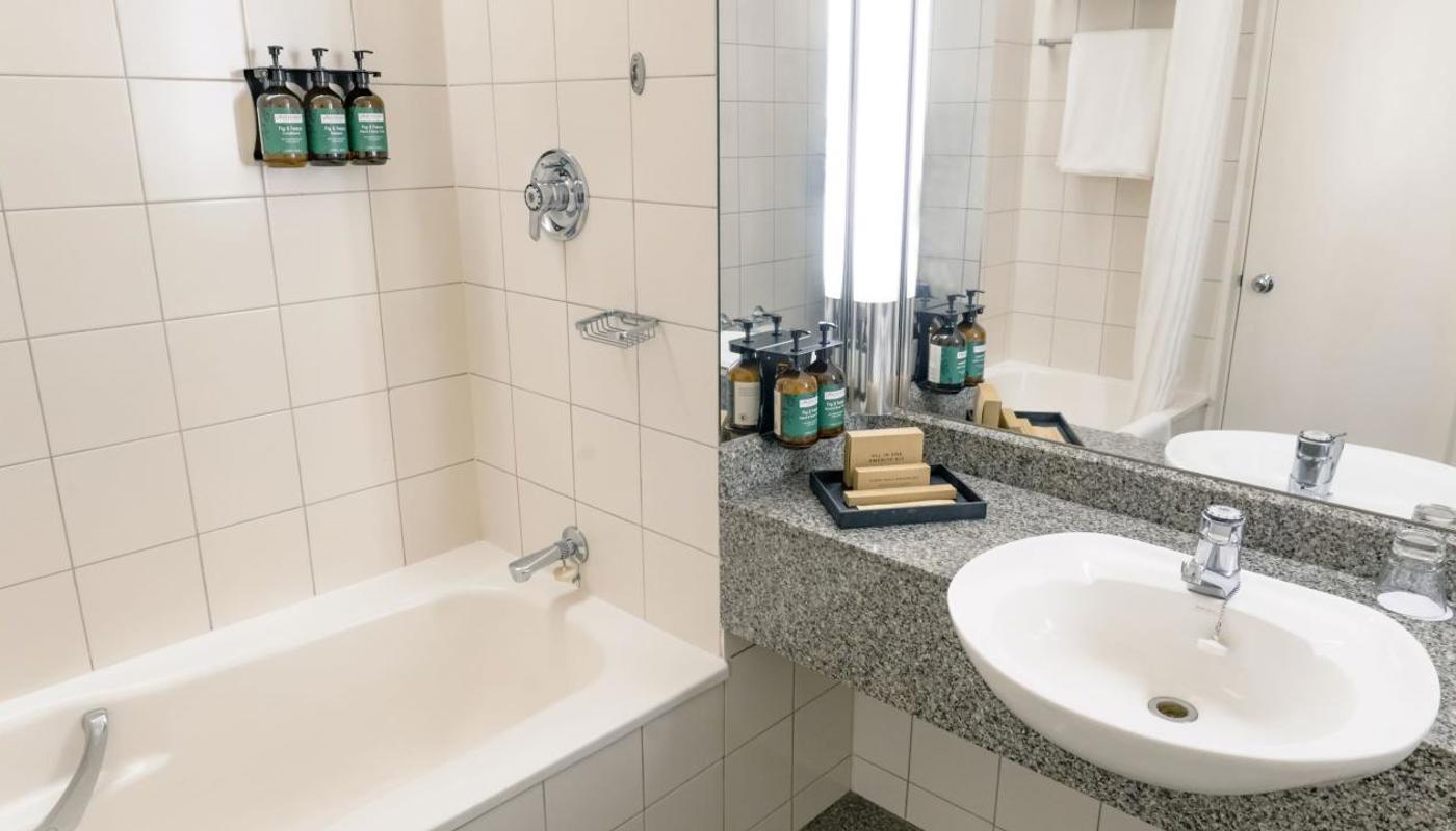 Standard en-suite bathroom with bulk amenities