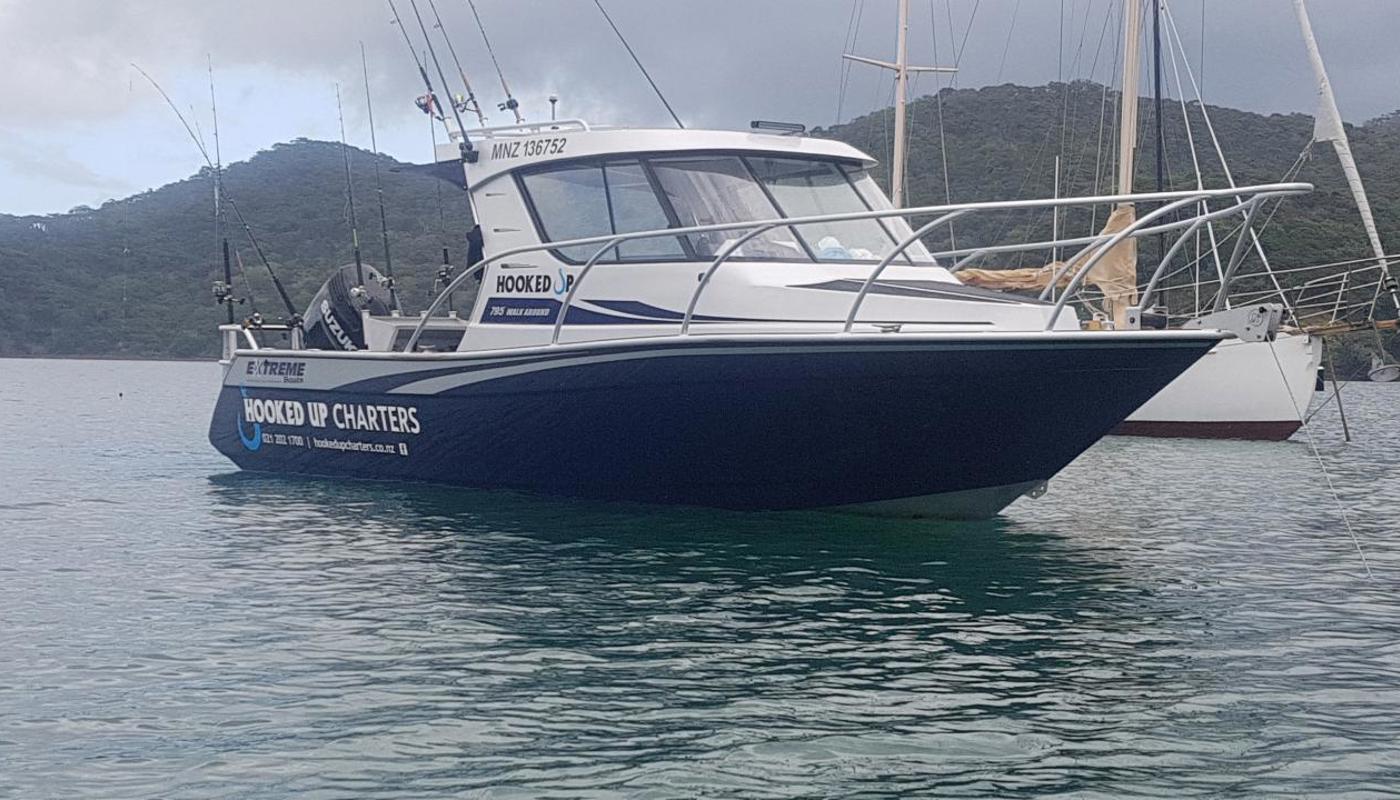Hooked Up moored in a bay at Great Barrier Island.