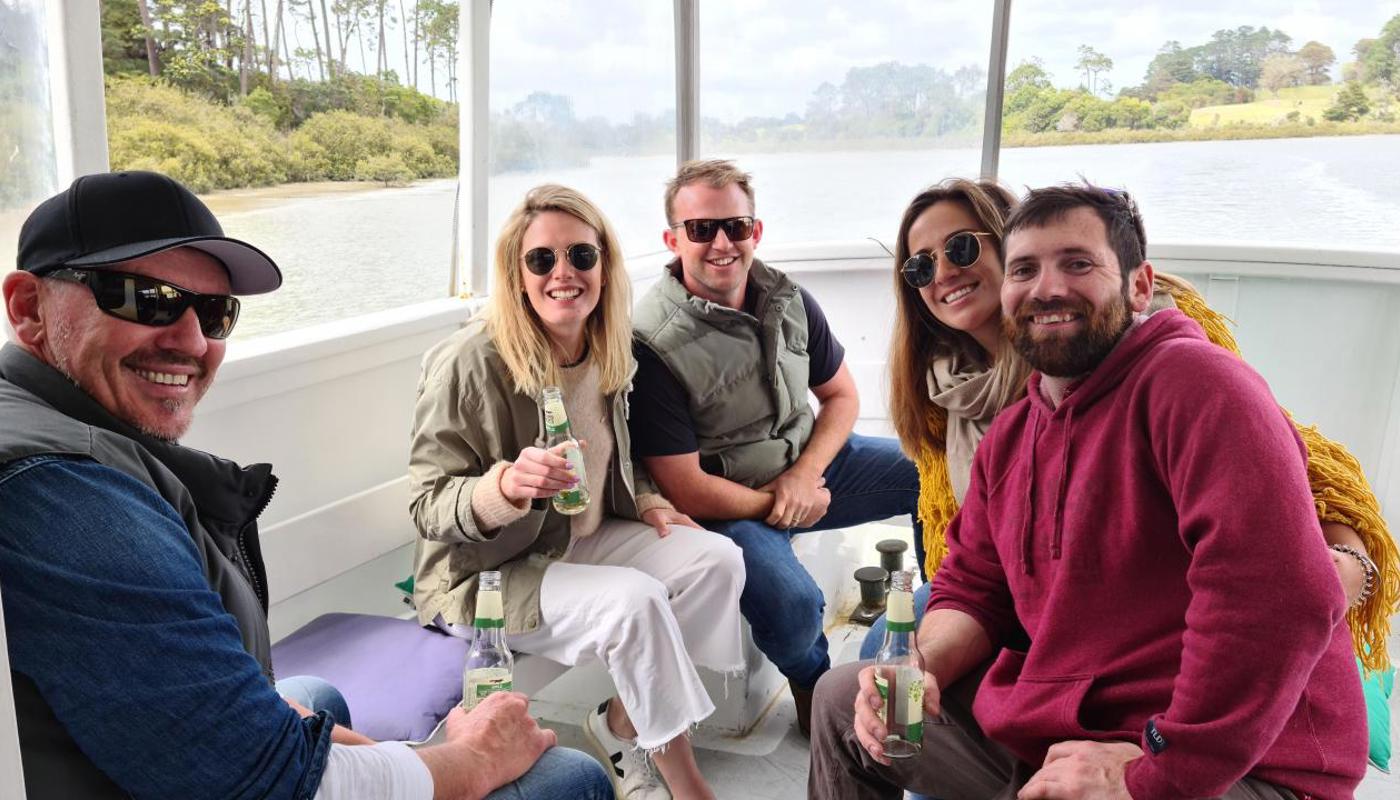 Guests enjoying a drink at the back of the Riverhead Ferry.