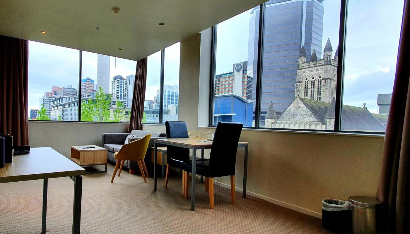 one bedroom apartment with sky tower view
