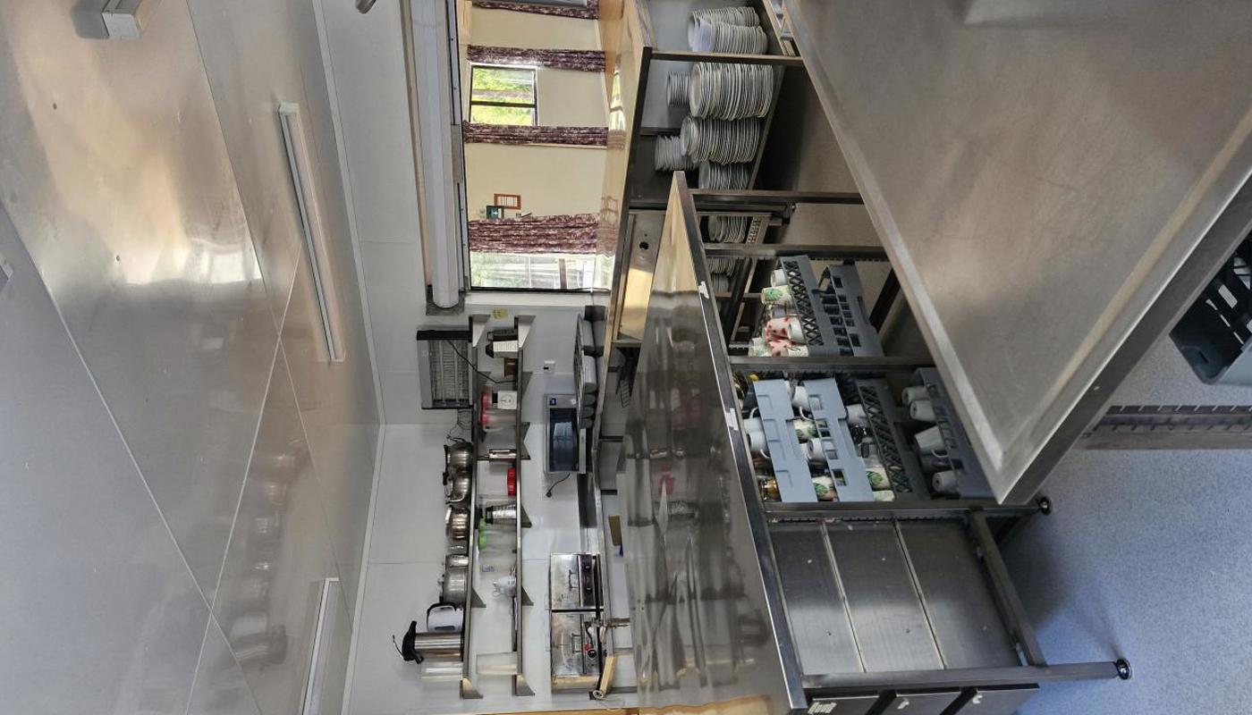 Commercial-style kitchen for self-catering or to bring in your own caterers.