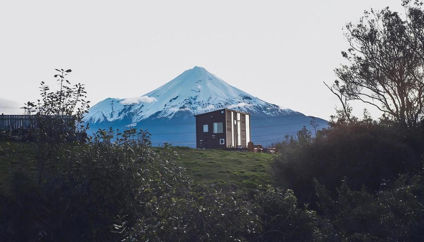 Experience the serenity of nature with breathtaking views from the comfort of our cosy tiny house.
