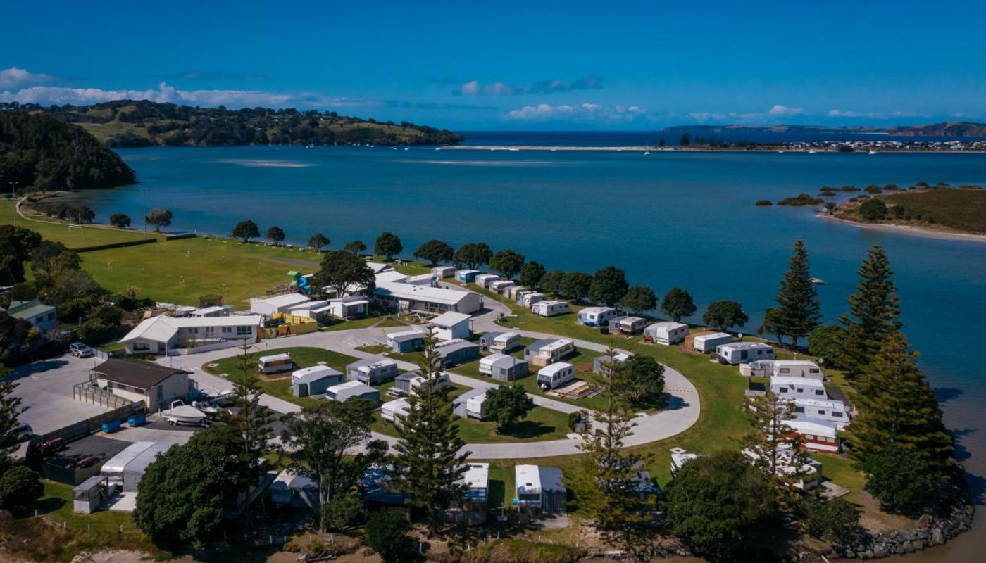 View of Whangateau Holiday Park out to Ti Point & Omaha