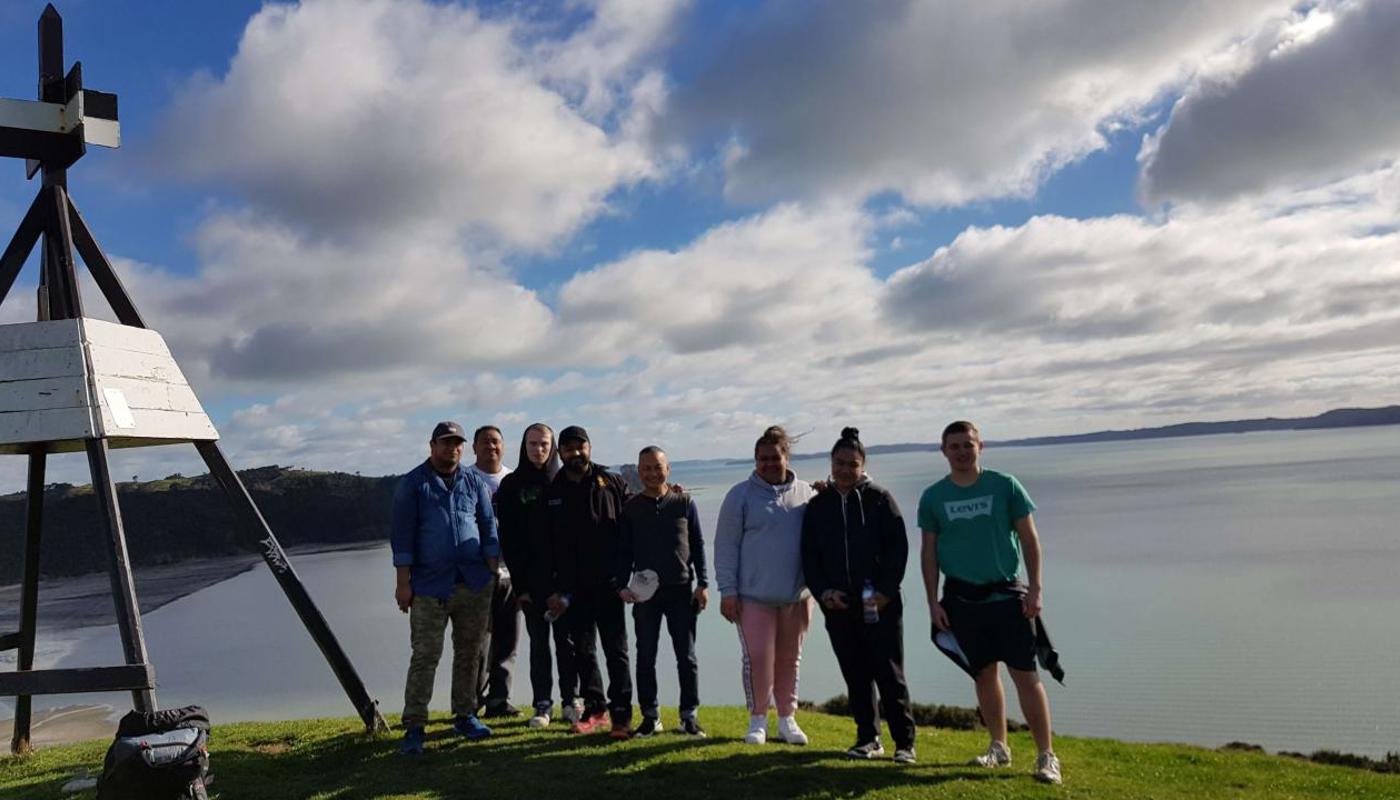 A tour group at the trig, just before morning tea.