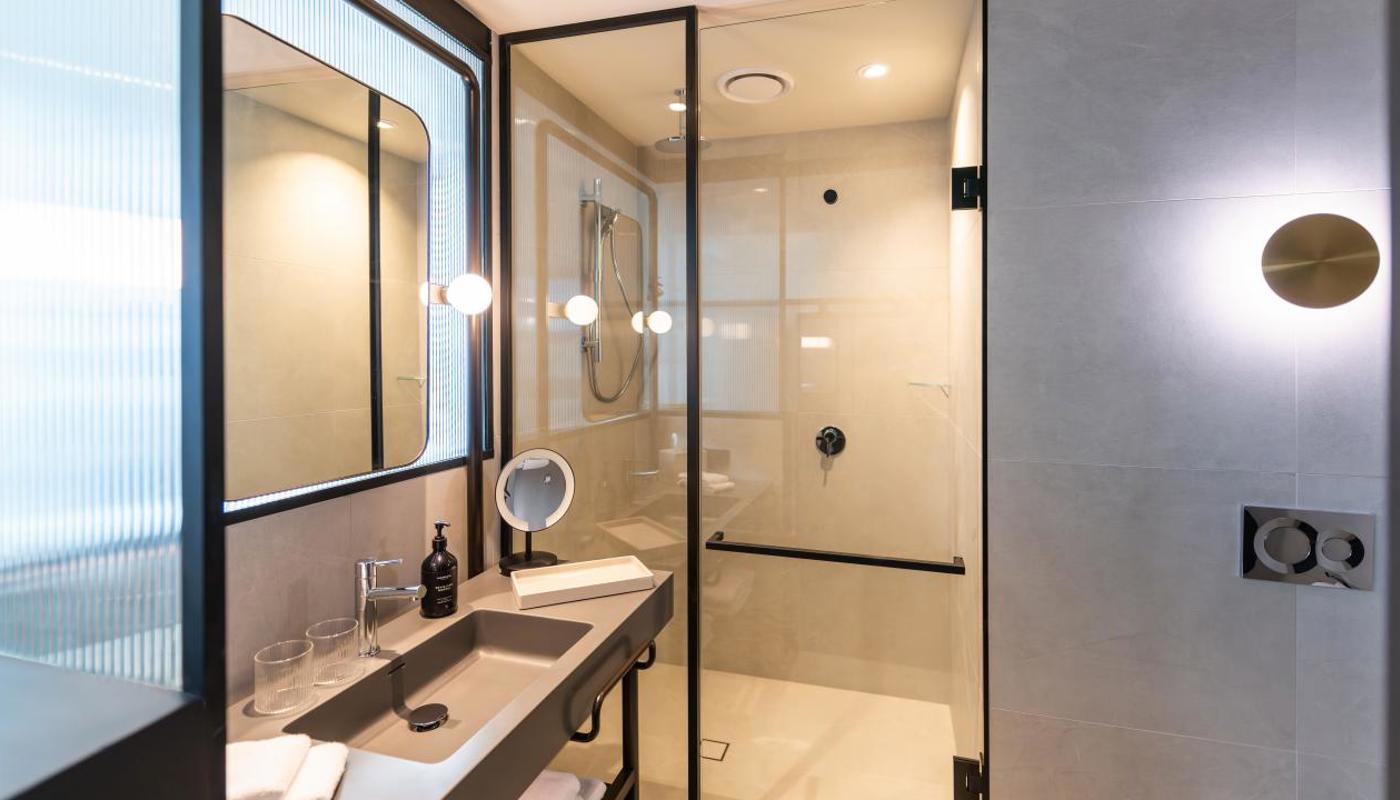 Spacious bathrooms with locally sourced amenities