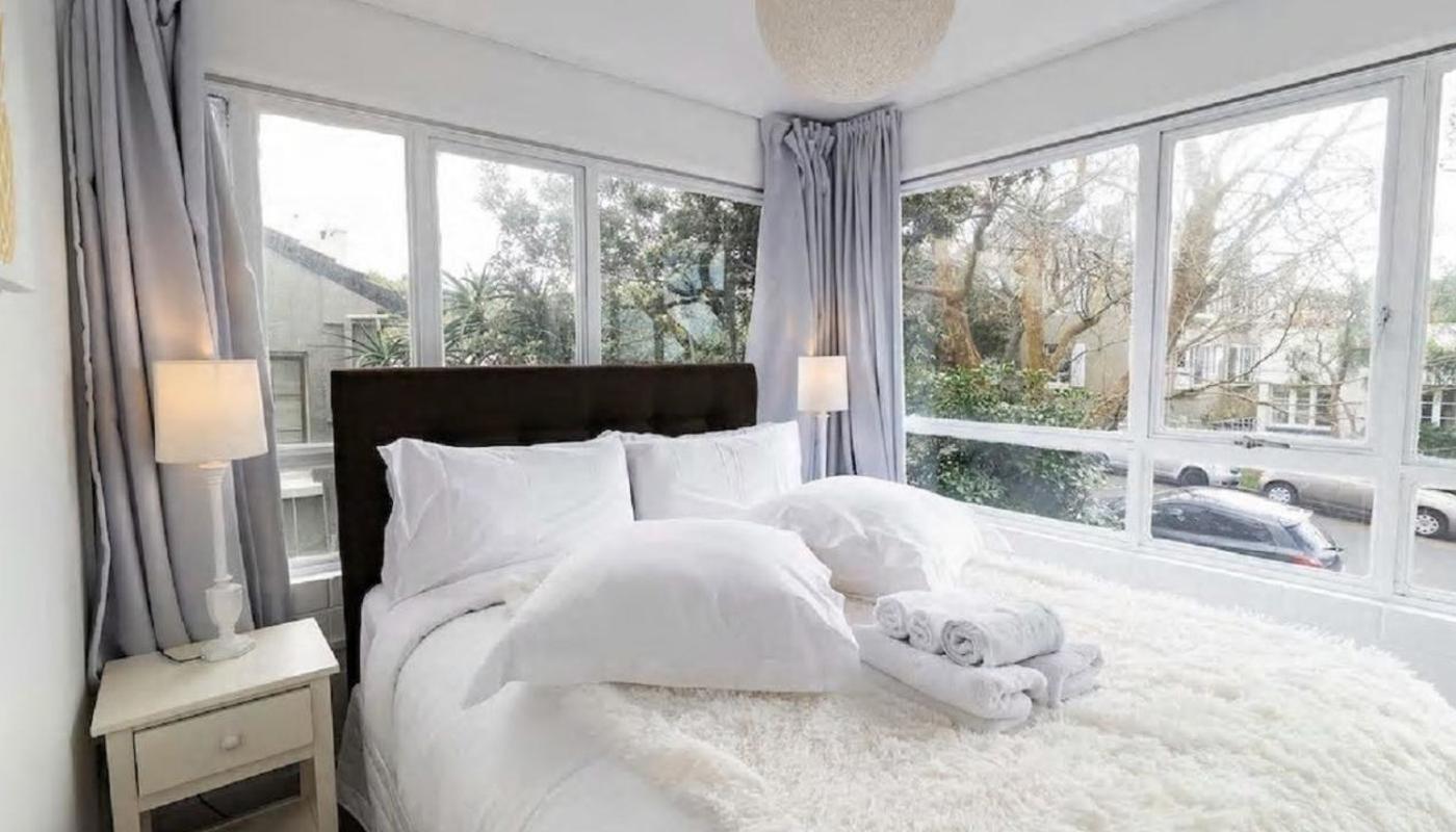The bedroom has a double aspect and an en-suite.