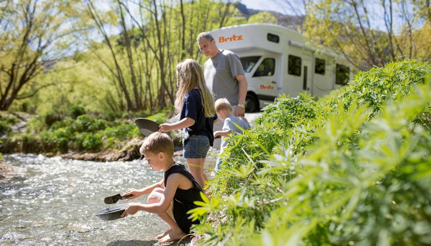 Kids playing in the stream