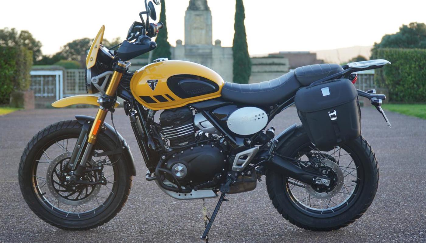 Triumph Scrambler 400 XC with luggage, available for motorcycle hire from Rideworks in Auckland.
