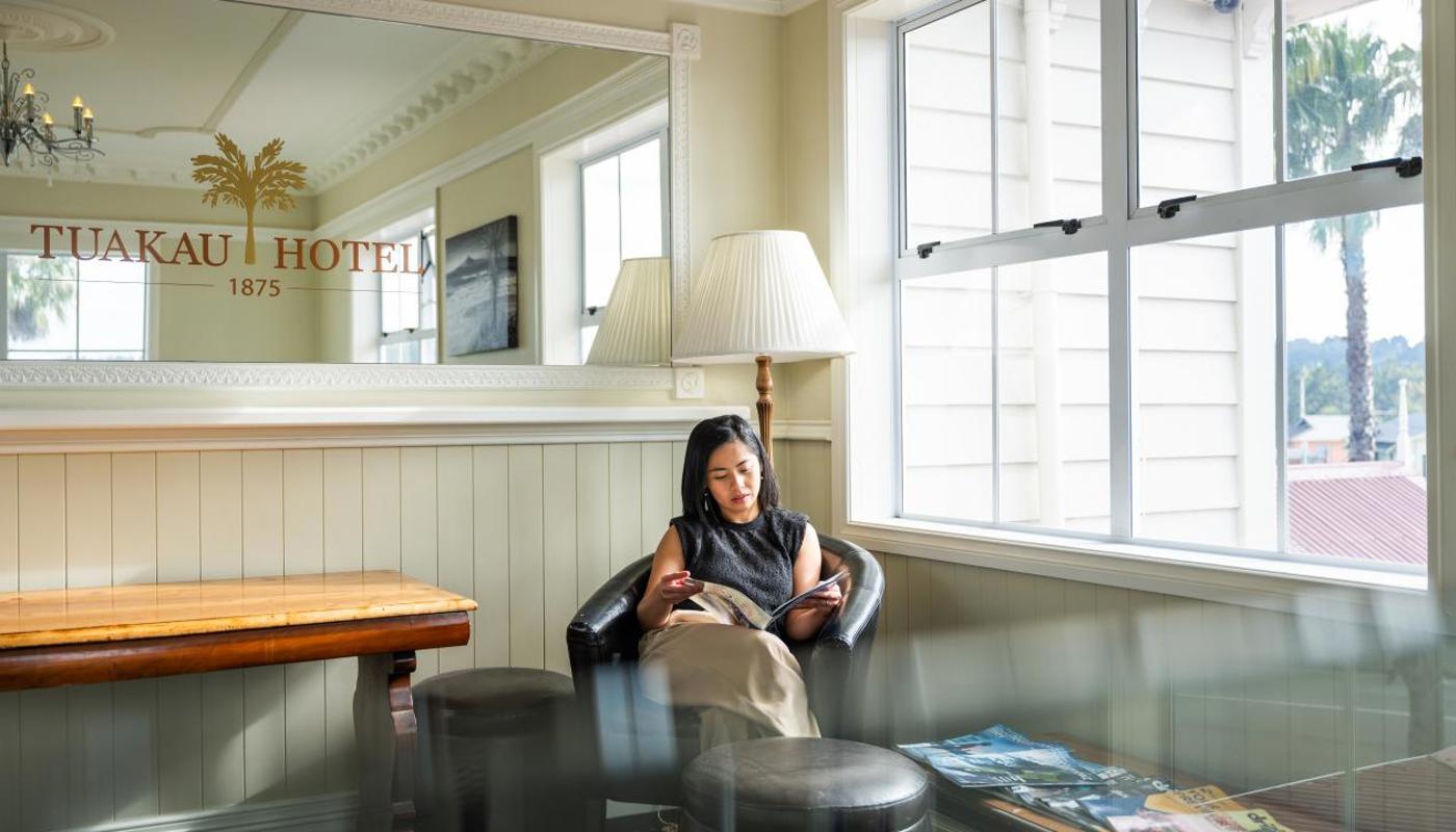 Relax in our light-filled guest lounge at Tuakau Hotel.