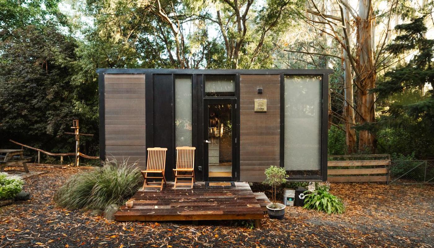 Nestled amidst lush greenery, our cosy tiny house offers a perfect retreat in nature.