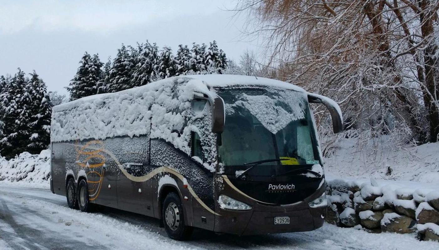 Coach in the snow