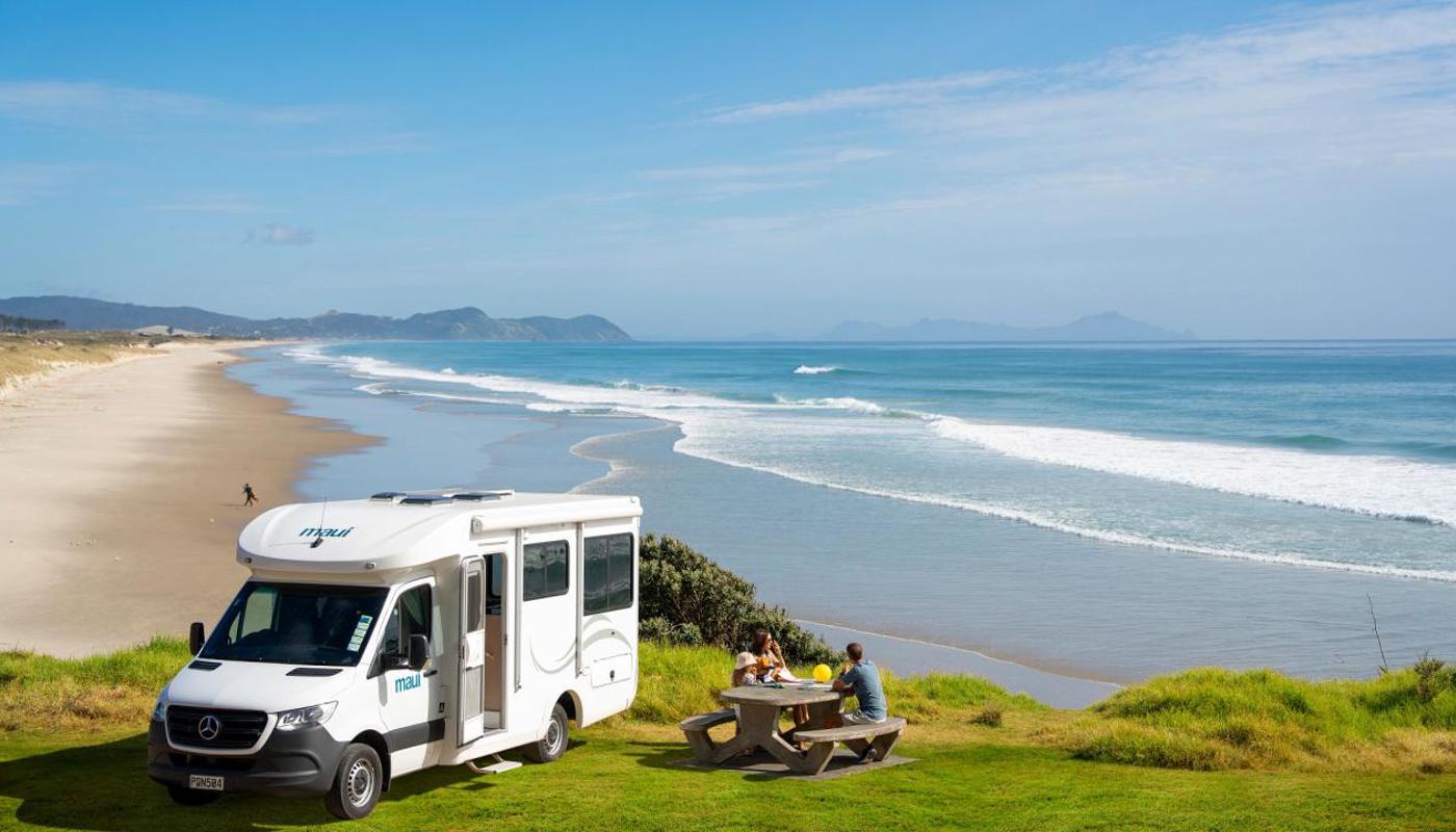 Park up by the beach.