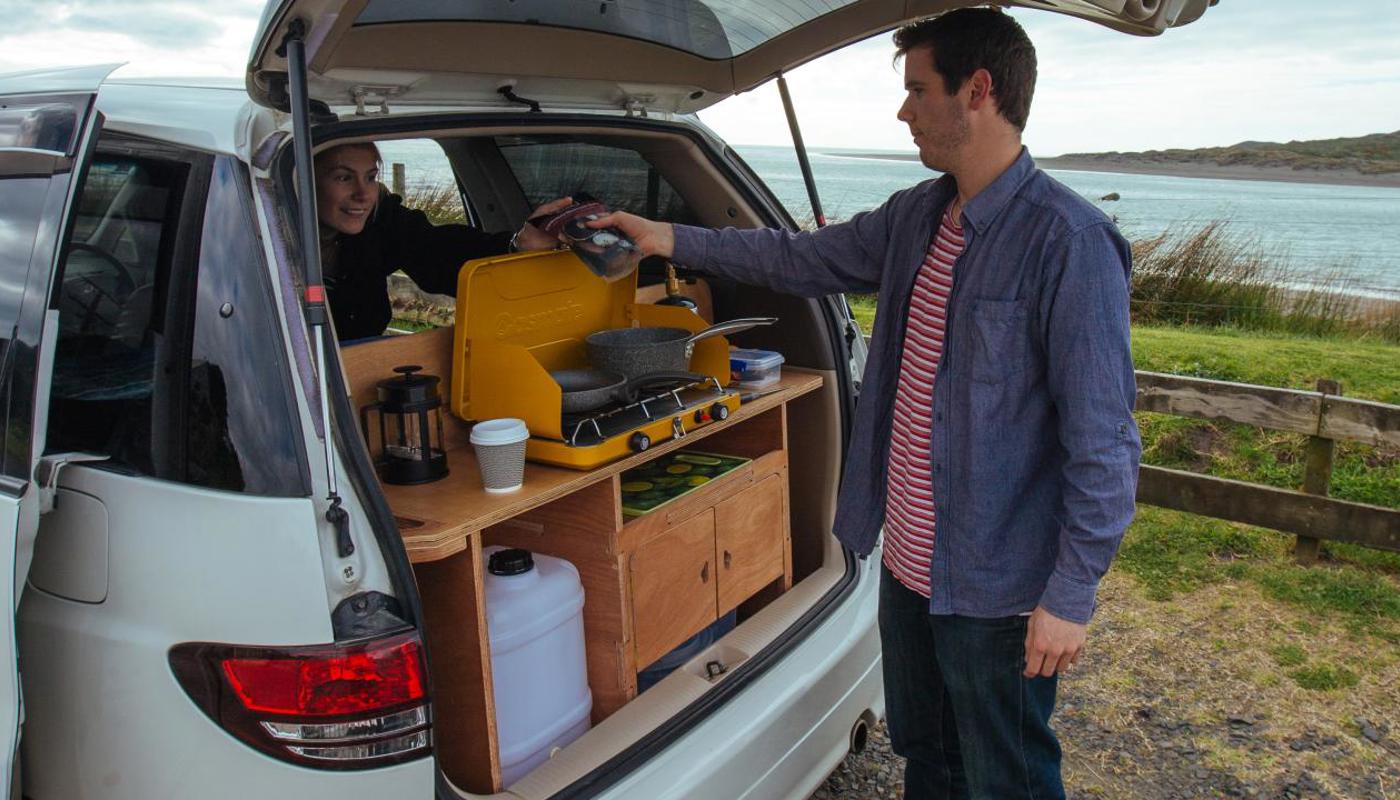 The boot lid doubles as a shelter for cooking in the fully equipped Mode Camper