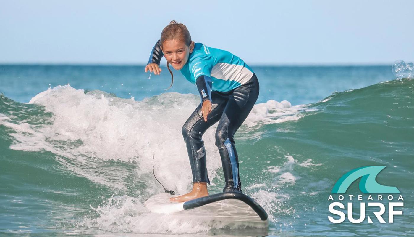 Learn to surf with Aotearoa Surf School - safe, easy & fun surf lessons for all ages & stages.