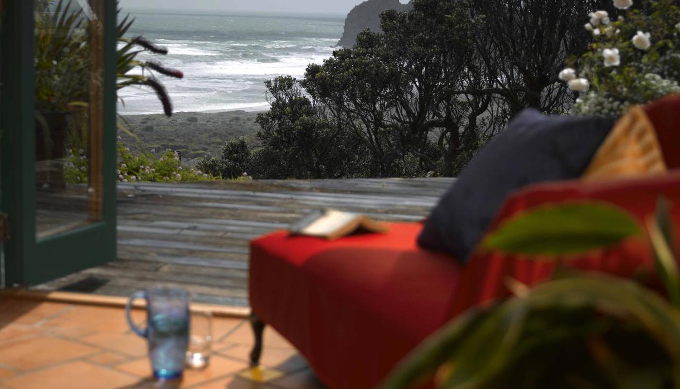 Te Koinga Cottage deck and view across the Tasman sea.