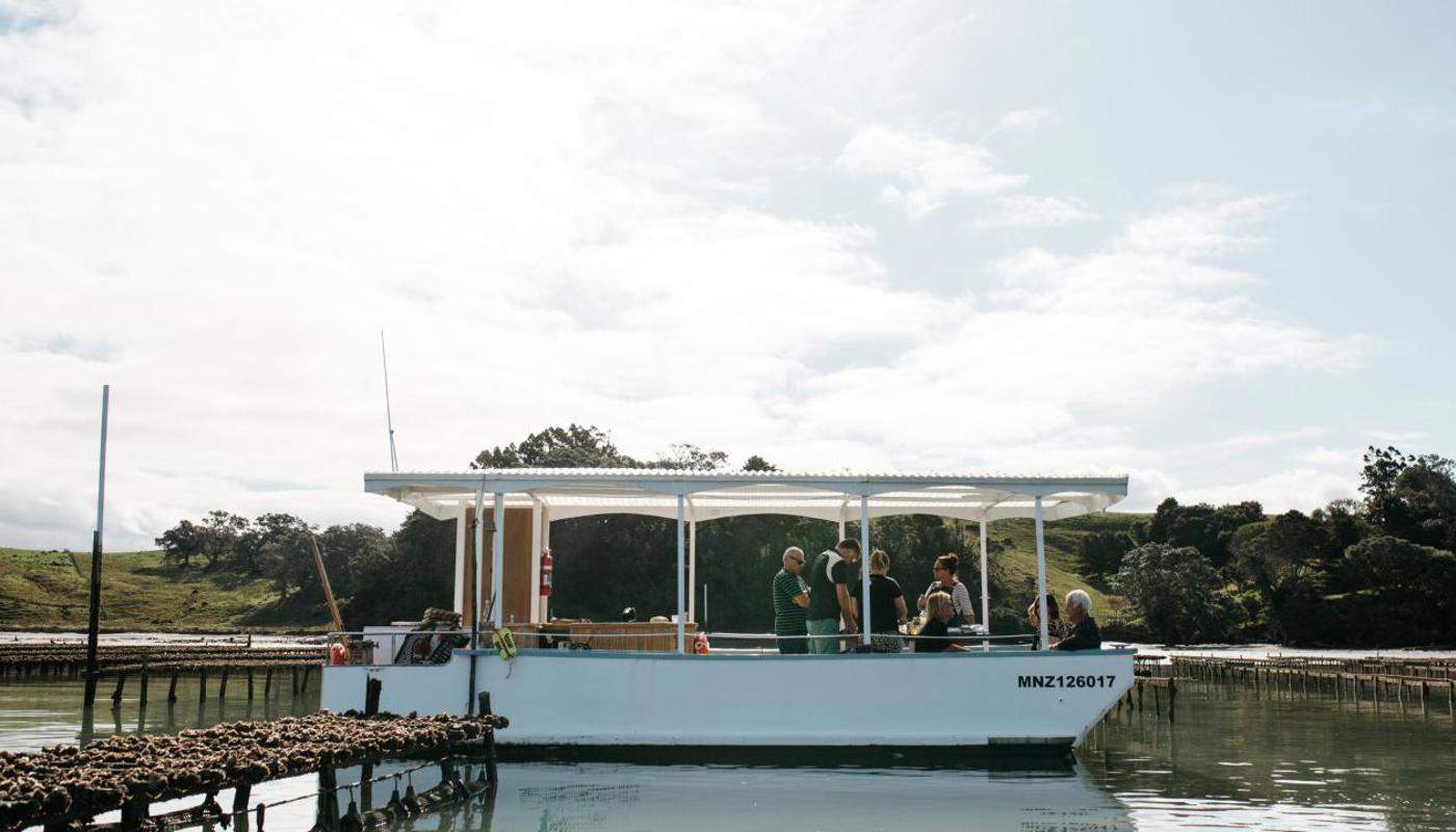 A safe calm ride over to a working oyster farm, seeing the process up close.