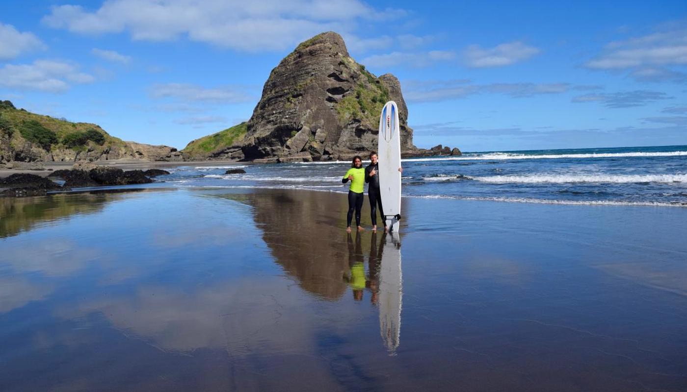 Surf coach and student