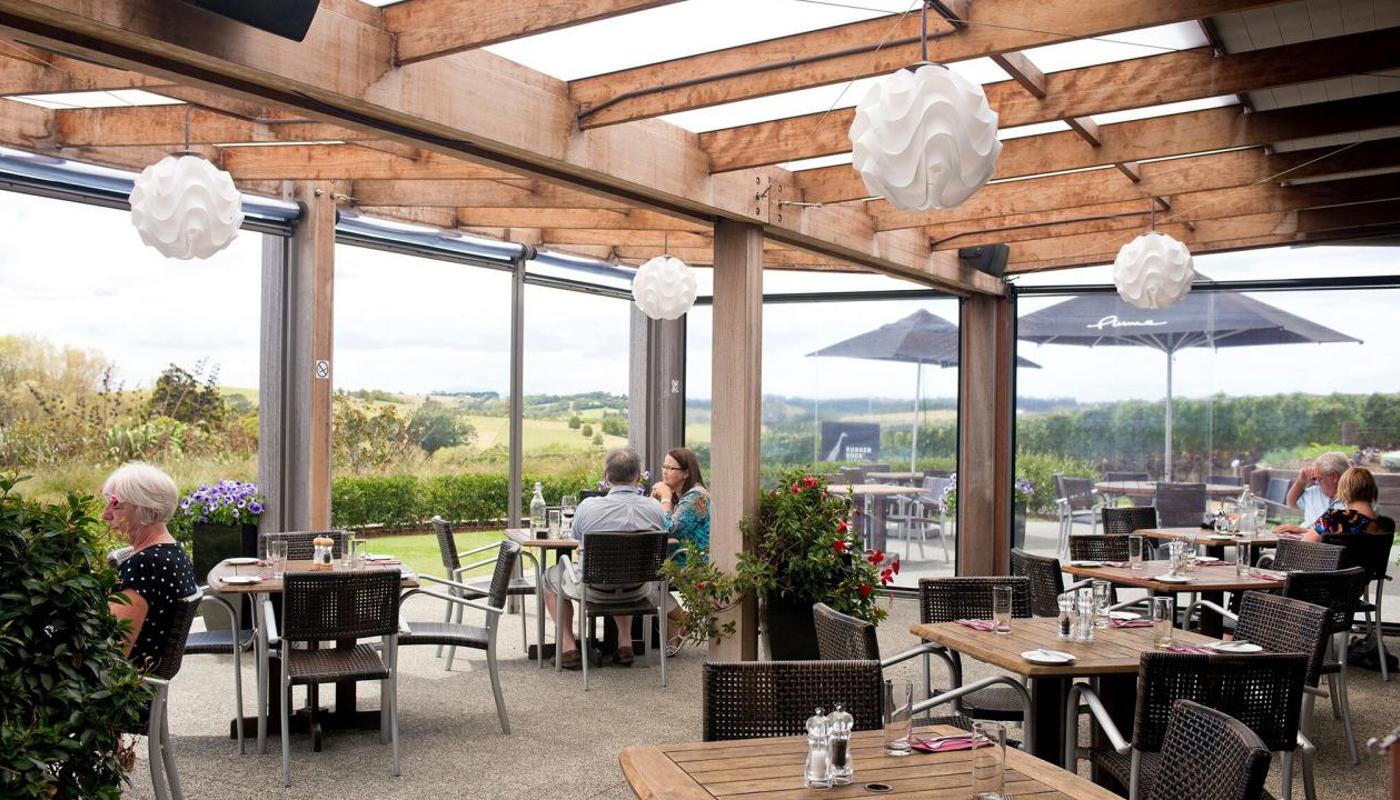 Patio dining at Plume. Beautiful vineyard environment.