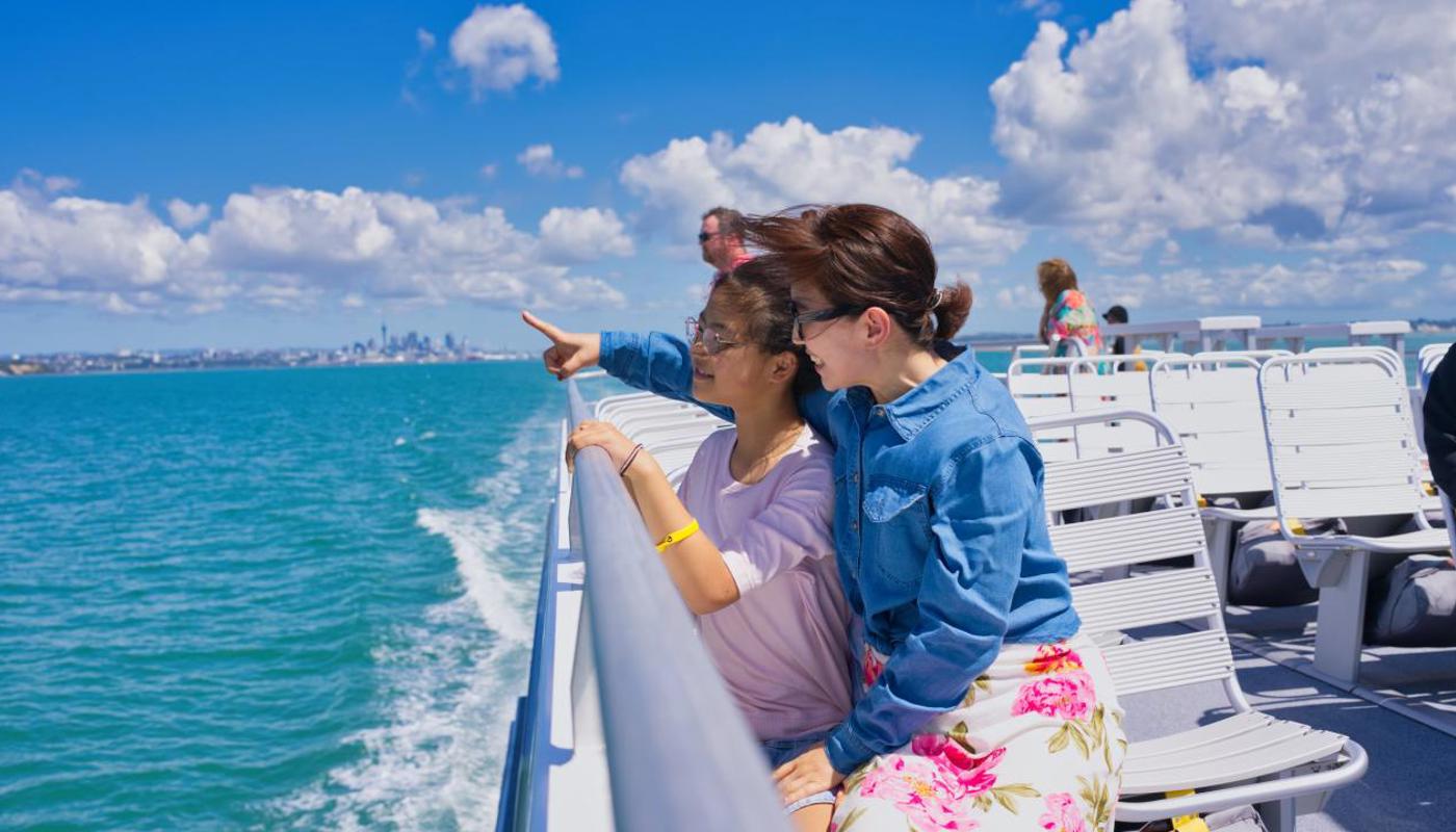 Passengers on the roof deck onboard Tuhi-rapa