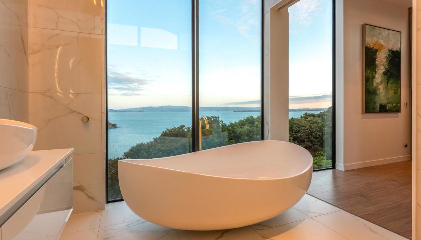 Indulge in pure relaxation with an oversized bath and mesmerising sea views at Villa Haven.