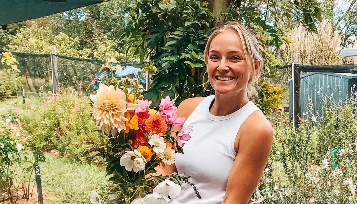 Happy customer picking flowers for their wedding at Slow Blooms.