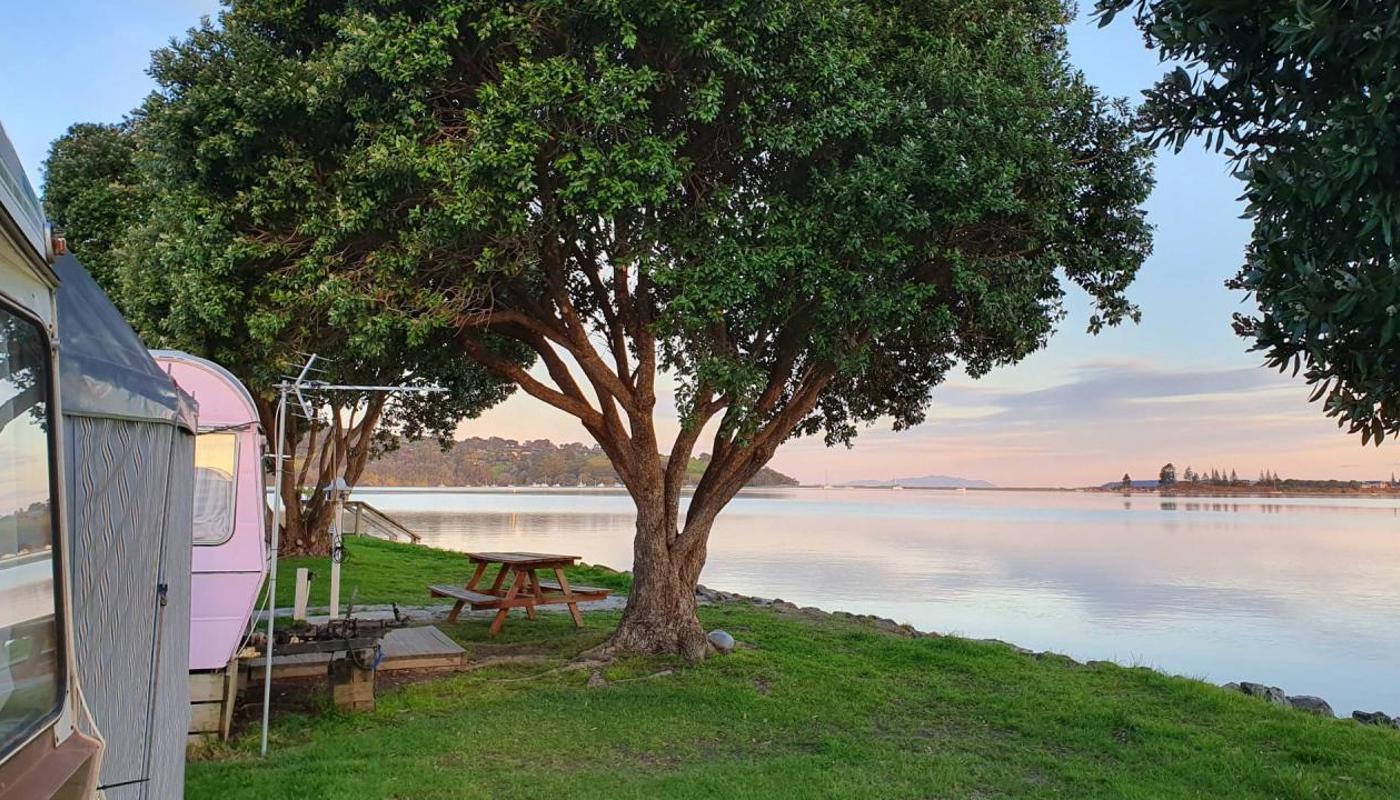 View across Whangateau Holiday Park from our waterfront caravans